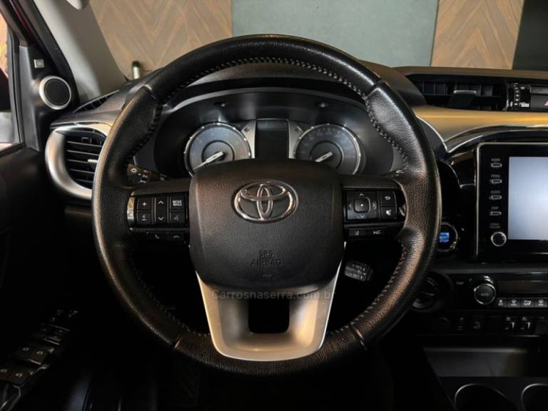 TOYOTA - HILUX - 2021/2021 - Vermelha - R$ 244.900,00