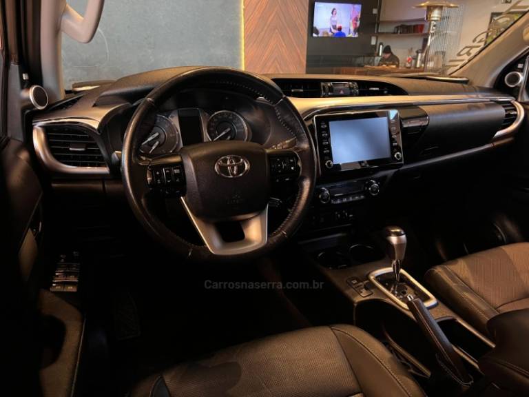 TOYOTA - HILUX - 2021/2021 - Preta - R$ 244.900,00