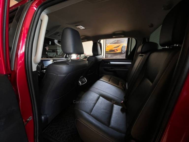 TOYOTA - HILUX - 2021/2021 - Vermelha - R$ 244.900,00