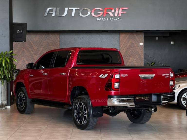 TOYOTA - HILUX - 2021/2021 - Vermelha - R$ 244.900,00