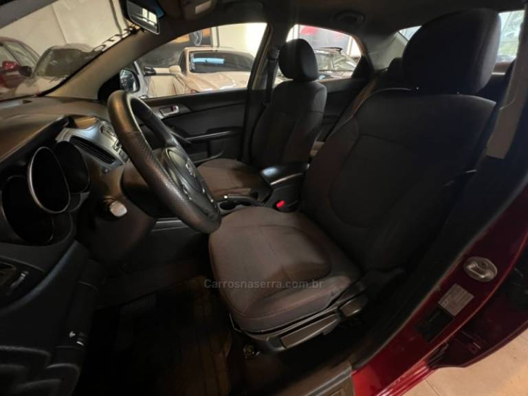 KIA MOTORS - CERATO - 2010/2011 - Vinho - R$ 44.900,00