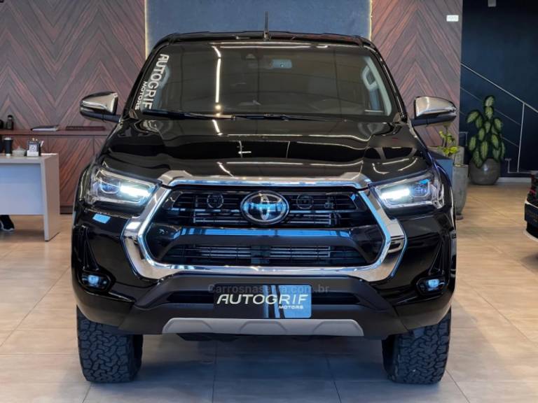TOYOTA - HILUX - 2021/2021 - Preta - R$ 244.900,00